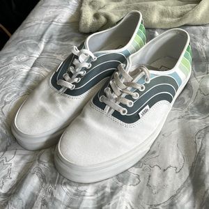 White vans with green and blue stripes